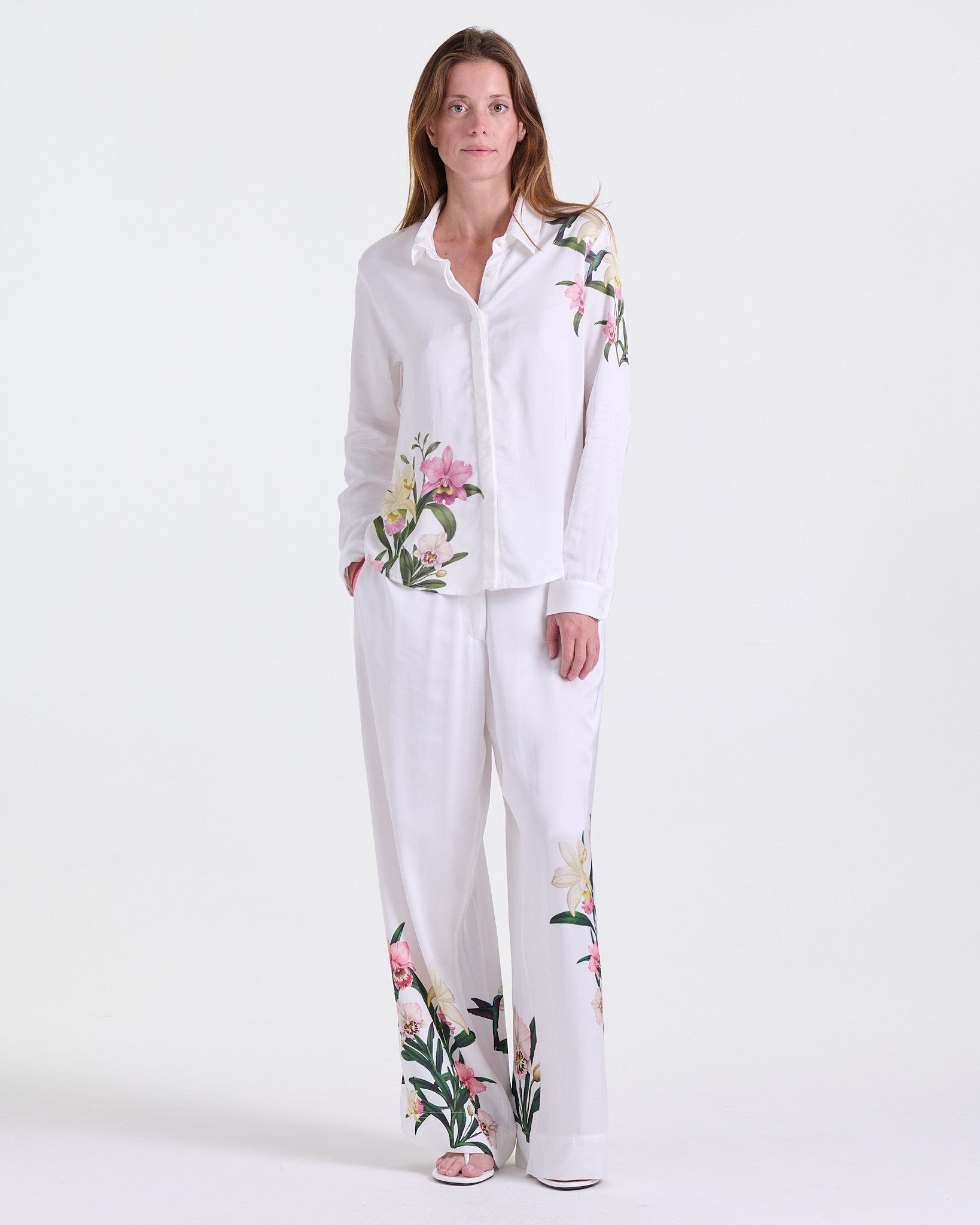 Deméa Paris Andia Flowy Shirt and Andia Flowy Pants in white floral print, Resort Escape capsule.