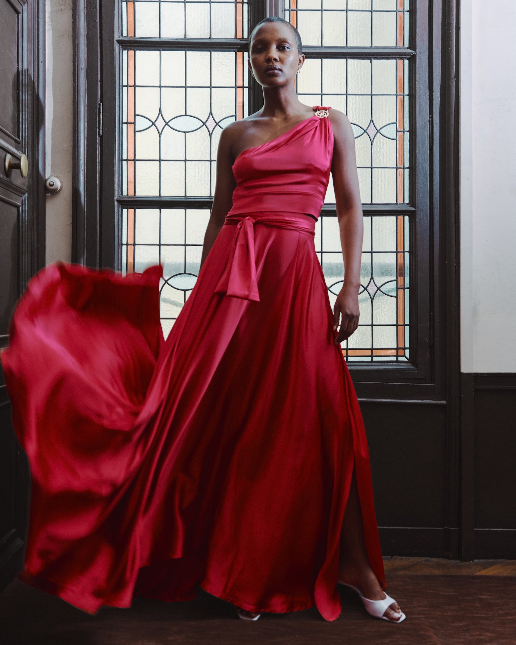 Deméa Paris Annie Asymmetrical Top and Annie Long Skirt, RSVP capsule, by a Paris window.
