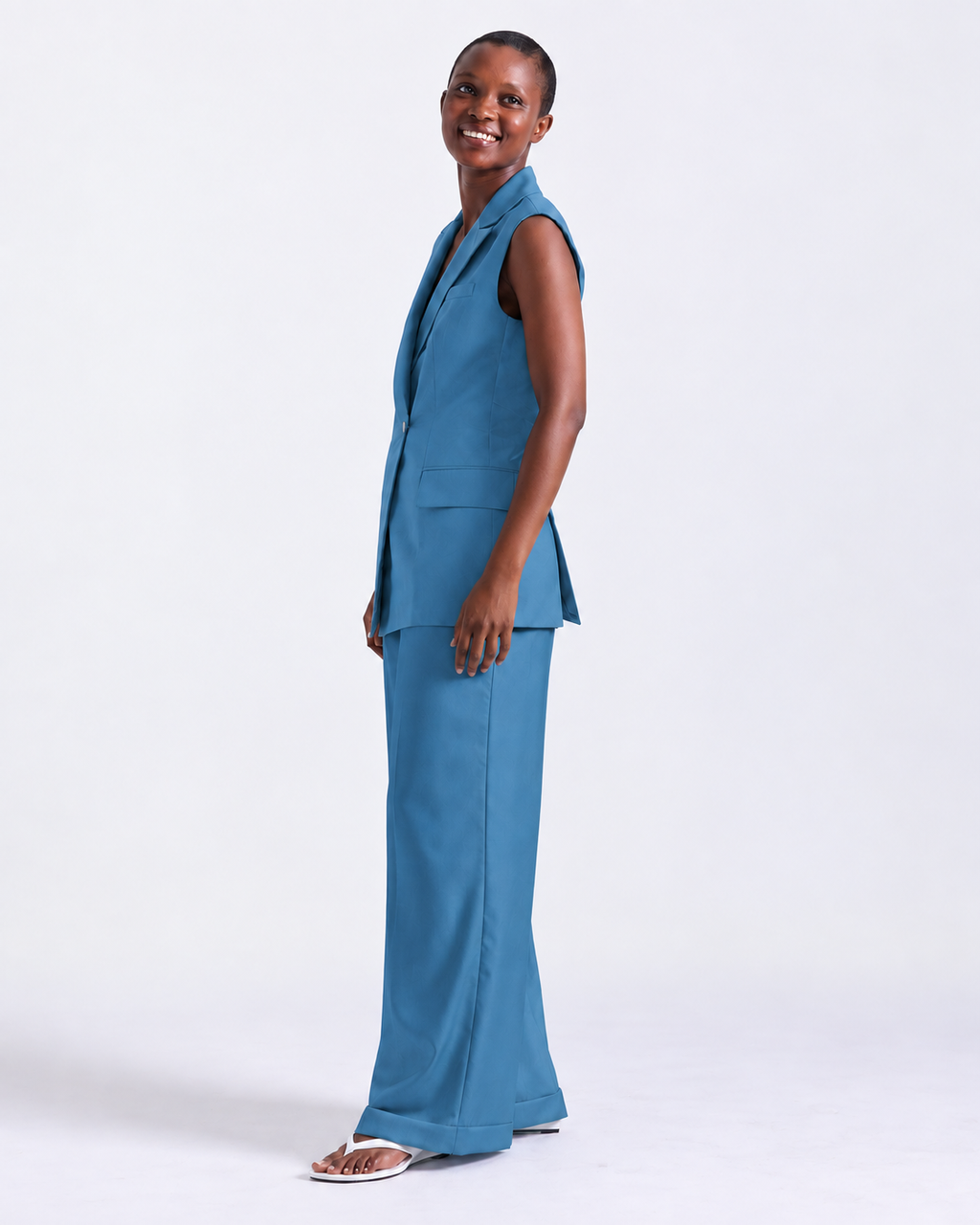 Alexandra Sleeveless Jacket in Teal, side vents at the back, Work edit, Deméa Paris