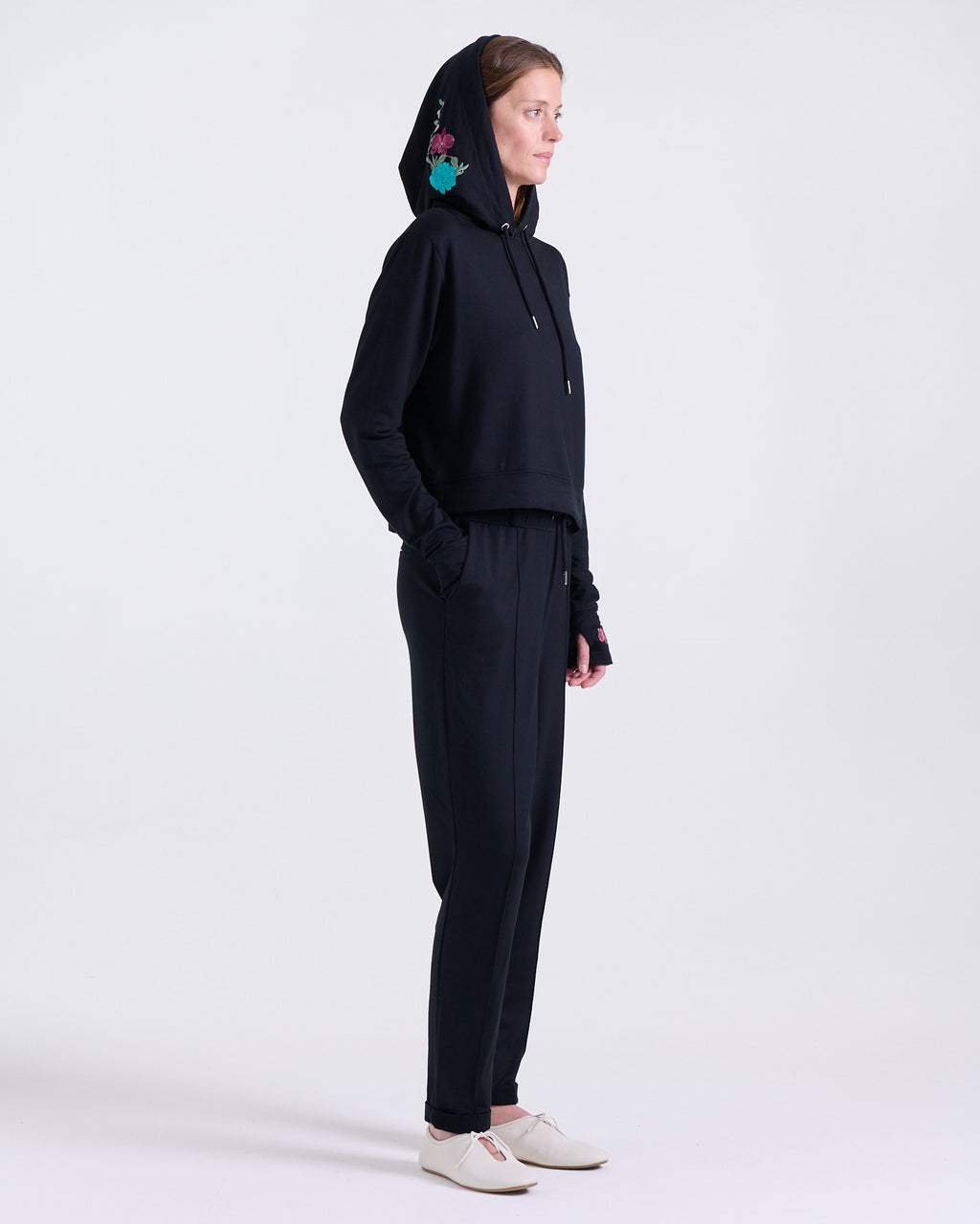 Alice Hoodie in Black, long sleeves with thumbhole cuffs, Boarding Call edit, Deméa Paris