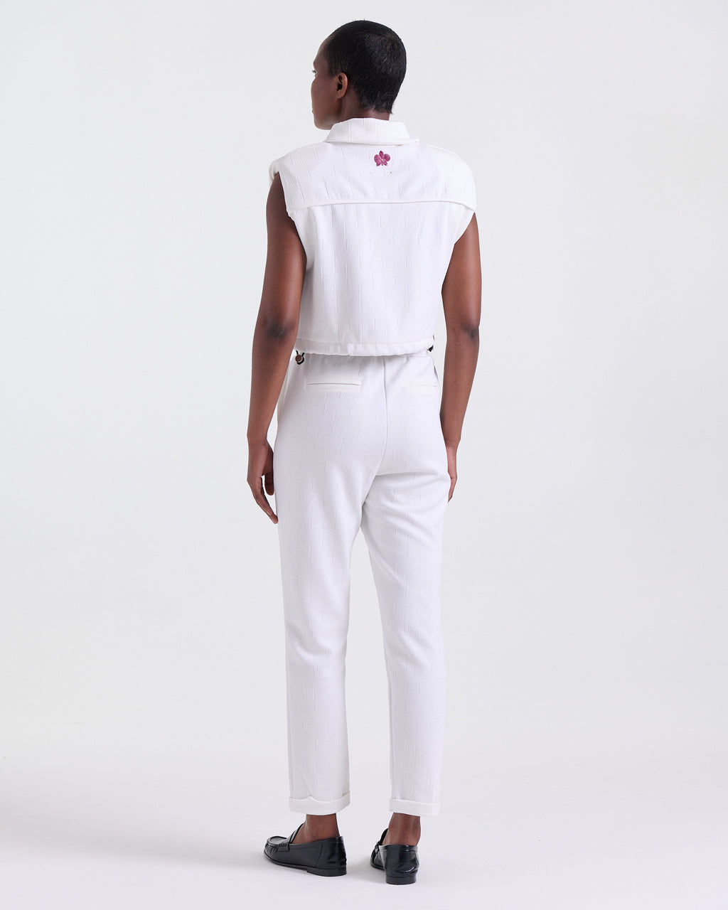 Alicia Jacket in Off White, sleeveless with structured shoulders, Boarding Call edit, Deméa Paris