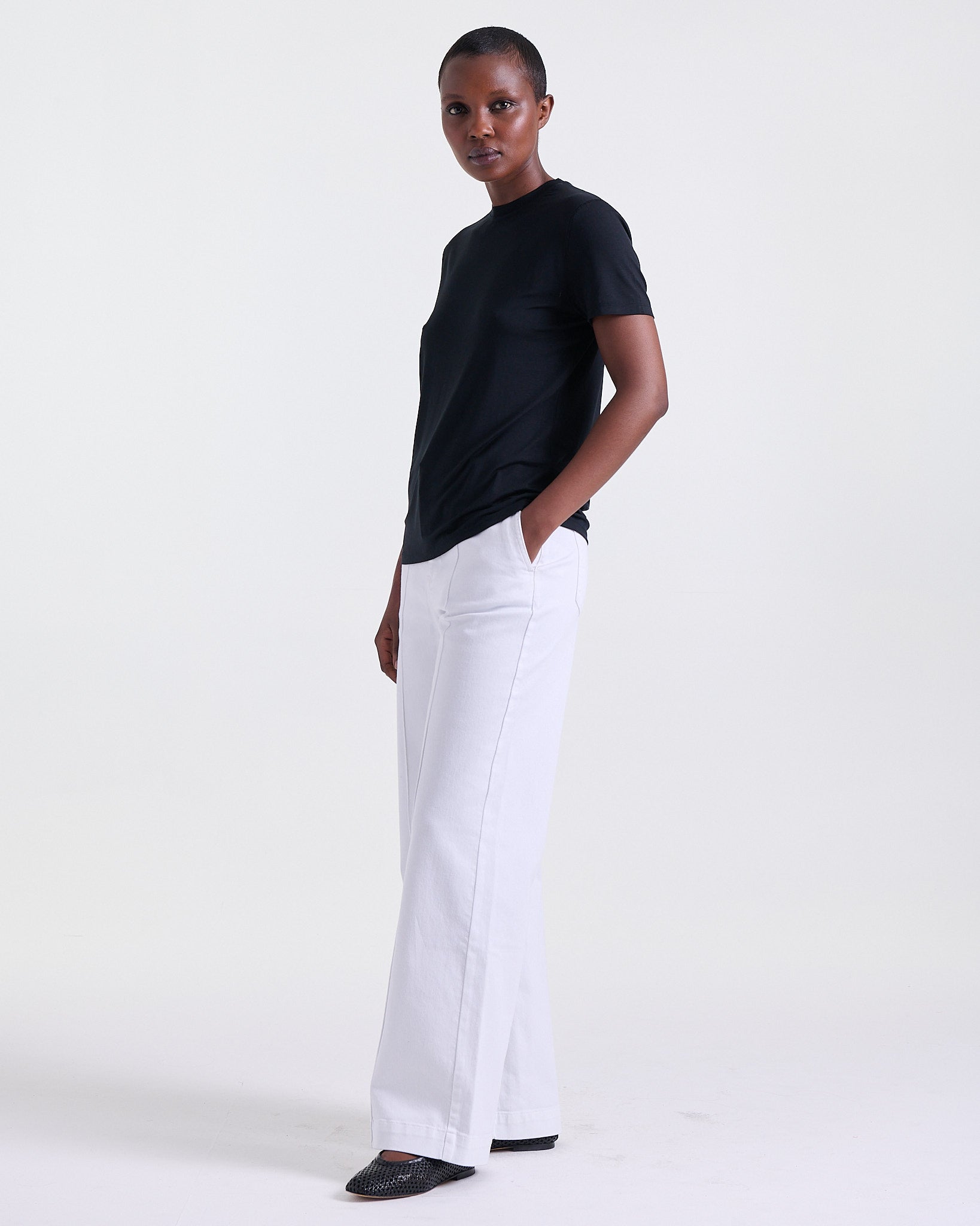 Amira T-shirt in Black, lightweight feel, Boarding Call edit, Deméa Paris