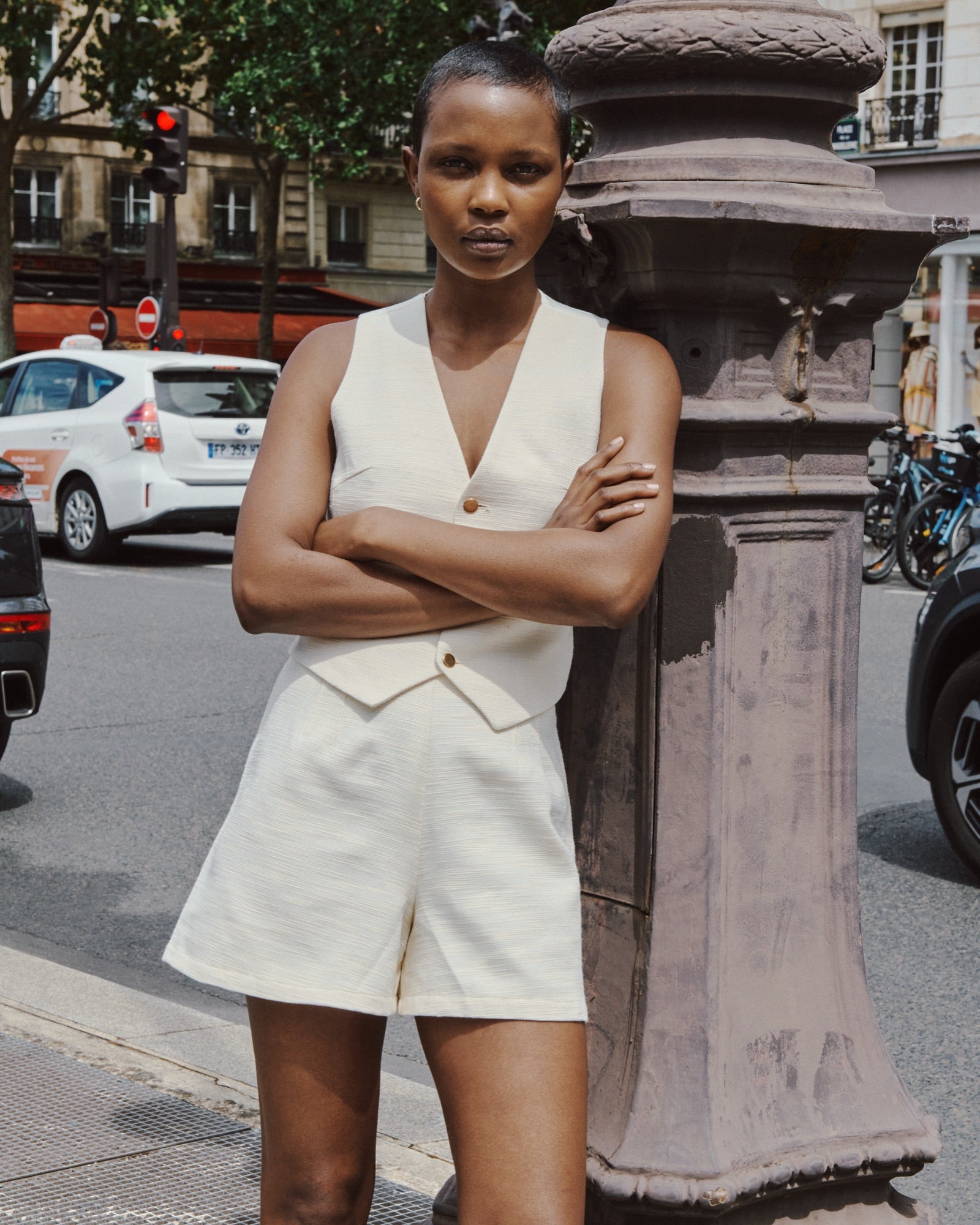 Deméa Paris Ariel Waistcoat and Ariel Shorts in off white, on a Paris street, Summer Sale edit